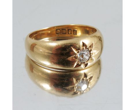 An 18 carat gold diamond set ring, London 1916, the old cut brilliant of approximately 0.15 carats estimated, finger size N, 