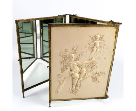 A 19th century French Aesthetic Movement brass triptych dressing table mirror, having two celluloid panels, one painted with 