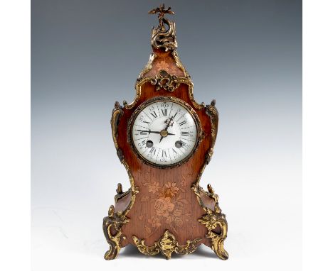A French Louis XV style mantel clock, the kingwood case with inlaid floral decoration&nbsp;and gilt metal mounts, the strikin