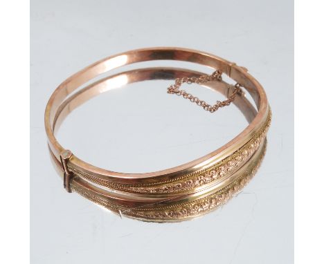 A 9 carat gold hinged bangle, Birmingham 1913, internal diameter 5.8cm, 6.3g gross