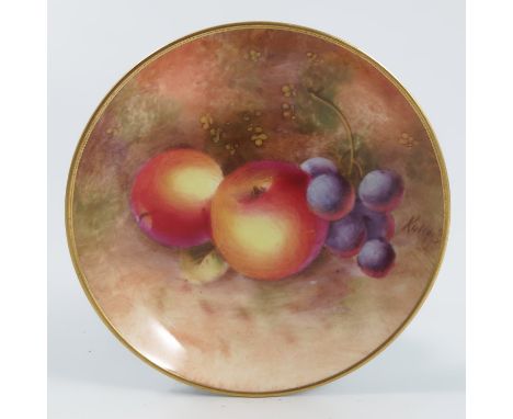 A Royal Worcester pin dish, of circular form, decorated with fruit to a mossy background by Roberts, dated 1952, diameter 3.7