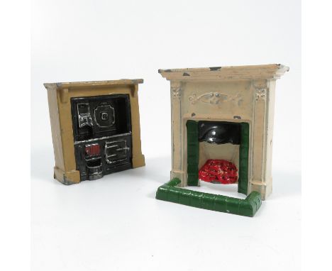 A Taylor &amp; Barrett painted lead fire place and fire surround, height 3ins, together with a painted lead kitchen range wit