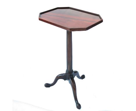 An antique occasional table, the elongated rectangular tray top raised on a turned column terminating in a tripod base, maxim