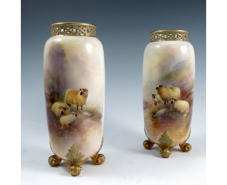 A pair of Royal Worcester cylindrical vases, with pierced rims, decorated with sheep in landscape to the front and a small la