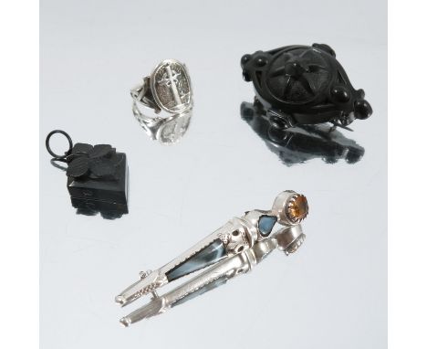An Iona silver Celtic cross ring, stamped 'CAI', together with a Victorian hinged bangle, circa 1880, two jet items and four 