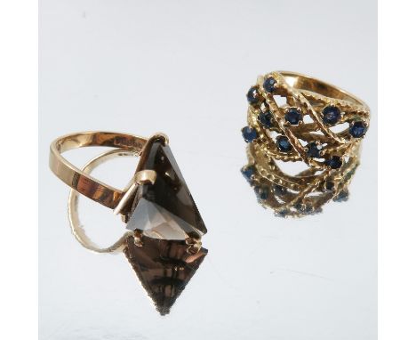 An unusual smoky quartz 9 carat gold ring, London 1967, finger size M, together with a 9 carat gold sapphire dress ring, Lond