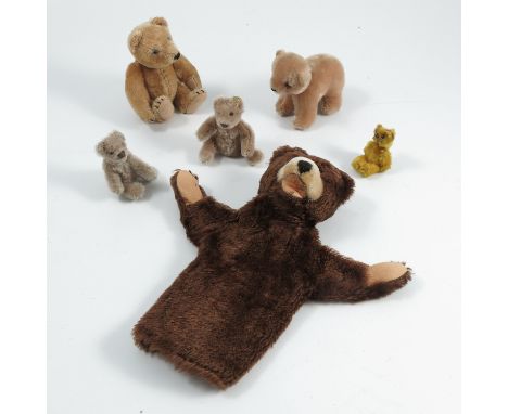 Various small plush bears, one with Steiff button in its ear, another possible Schuco bear, a hand puppet and two teddy bear 