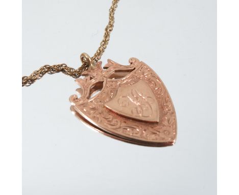 A 9 carat gold watch fob, on a chain, together with a German chain stamped '333', 16g gross