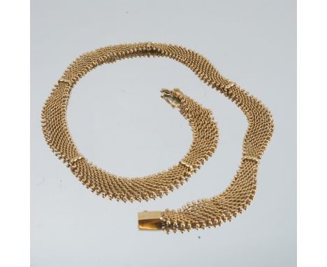 An 18 carat gold mesh collarette, 42.5cm long, 33g gross