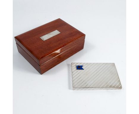 A Cartier silver cigarette case, of rectangular form, with push button opener, the ribbed ground applied with an enamelled fl