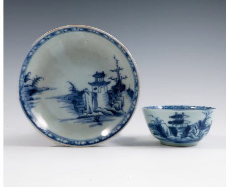An Oriental blue and white tea bowl and saucer, bearing a sticker from the Christie's Nanking Cargo auction Lot 5060Condition