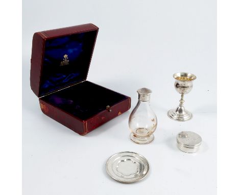 An Elkington &amp; Co cased silver travelling communion set, comprising a glass and silver mounted decanter with off top, a g