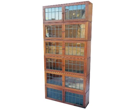 A six section Globe Wernicke style bookcase, with double leaded light doors