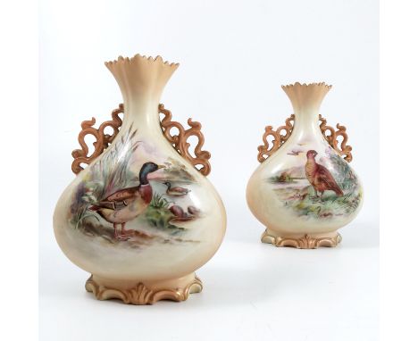 A pair of Locke &amp; Co Worcester blush ivory vases, having a pair of pierced scroll handles, the fronts decorated with wild