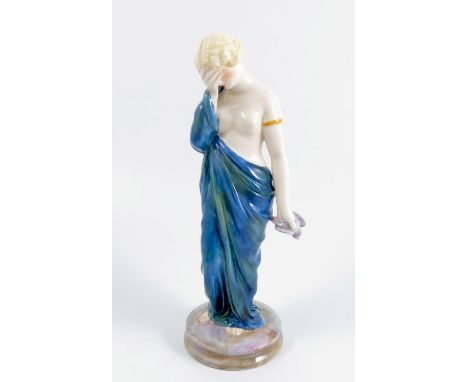 A Royal Worcester figure, Sorrow, modelled by James Hadley, inscribed to base in puce, model number 2/57, dated 1940, height 