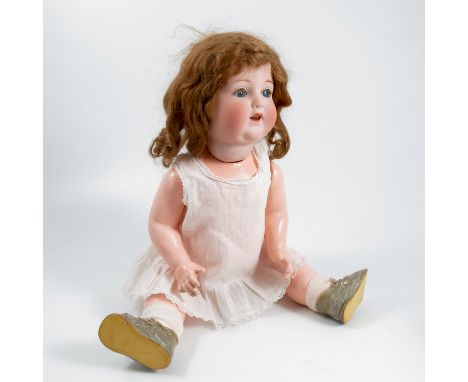 An Armand Marseille bisque headed doll,&nbsp; with sleeping eyes, mouth open with ceramic teeth, impressed Koppels Germany 99