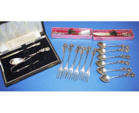 Cased three piece Hildesheim silver cutlery set including jam spoon, sugar nips & butter knife; together with another Hildesh