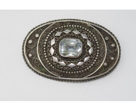 Vintage silver and blue stone brooch made in Jerusalem, tests suggest Topaz