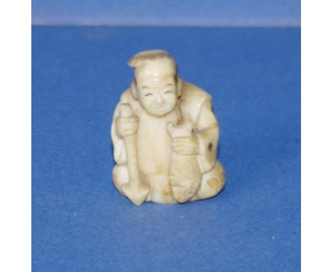 Vintage Japanese ivory netsuke Fisherman. Signed to base. May not be exported without CITES approval. Height 4cms approx.