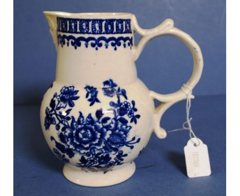 Late 18th Century Caughley porcelain jug blue & white floral decoration, mask head to spout. Height 15cms approx. Provenance: