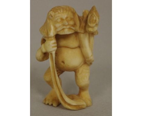 Antique Japanese ivory ogre netsuke signed to base, this item may not be exported without CITES documentation. Height 5cm app