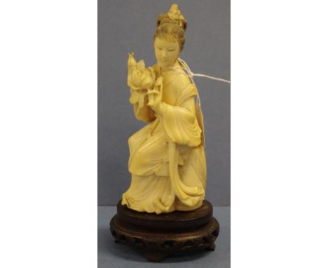 Antique Chinese ivory figure on stand seated woman with flowers, on carved wood stand. Export of this item would be subject t