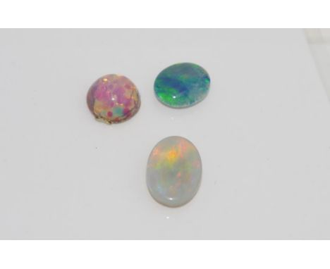 Unset solid opal with a triplet and an imitation