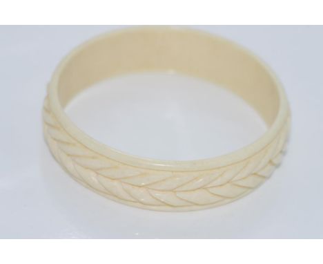 Vintage 1950s carved ivory bangle family piece since early-mid 1900s