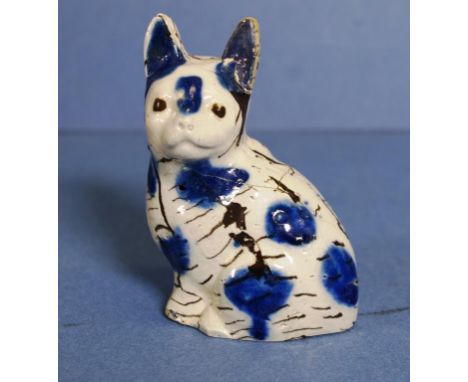 Antique ceramic seated cat figure restored, height 10cms approx. Provenance: The Dr. Margaret Giles Collection.
