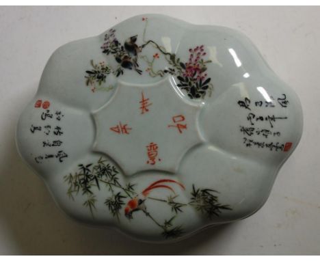 Chinese ceramic lidded box decorated with bird, floral and Chinese character marks, width 19cm approx
