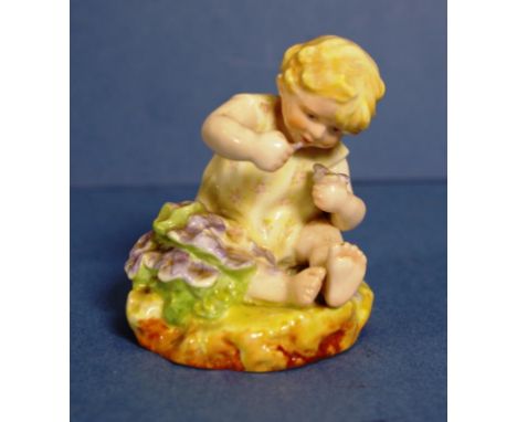 Royal Worcester Doughty seated child figure "Mischief" marked to base & # 2814. Height 8cms approx.