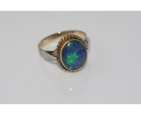 9ct gold and opal triplet ring weight: approx 2.55 grams, size: approx L-M/6 (tested as 9ct but unmarked)