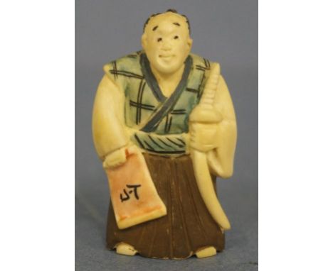 Antique Japanese samurai ivory netsuke C1920. Signed to base. May not be exported without CITES documentation. H5cms approx.