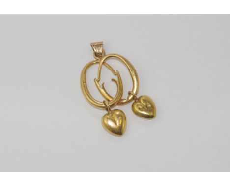 Vintage 18ct pendant with 2 heart drops weight: approx 3.2 grams, size: approx 3.5cm including bale (tested as 18ct)