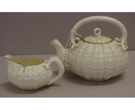 Victorian Belleek teapot with first black mark first version black mark to base; together with matching cream jug, also with 