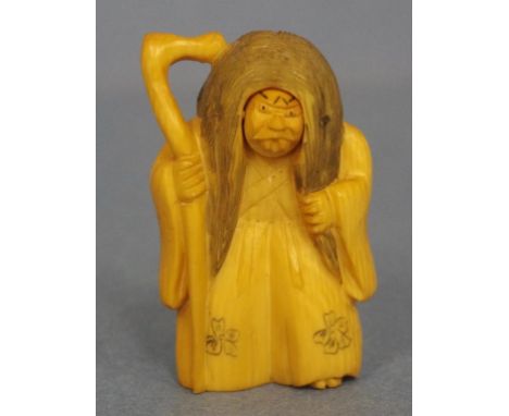 Antique Japanese ivory Netsuke with revolving face signed to base,C:1900. H5cm approx, this item may not be exported without 