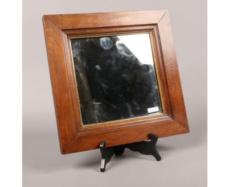A mahogany and parcel gilt framed square pier mirror.