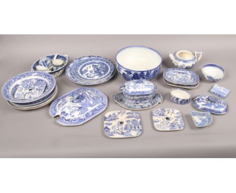 A collection of mainly 19th century pottery and pearlware etc. Mainly printed in the Willow pattern including sauce tureen an