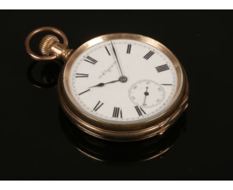 A gold plated Elgin pocket watch with enamel dial and subsidiary seconds.