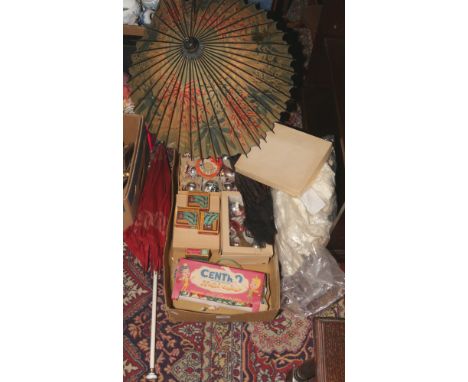 An Edwardian christening gown and pair of pumps, collection of parasols and vintage Christmas decorations.