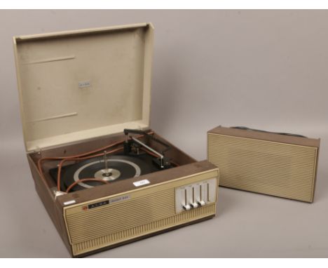 A portable Alba record player model 642 with speaker.