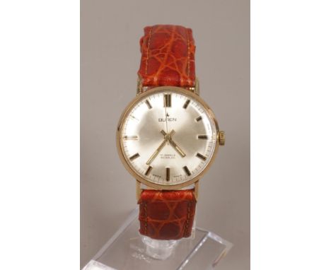 A gentleman's 9ct gold Buren manual wristwatch with satin dial and baton markers.Condition report intended as a guide only.No