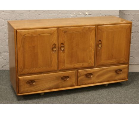 An Ercol 1980s Windsor sideboard model No. 455 in the Golden Dawn finish.