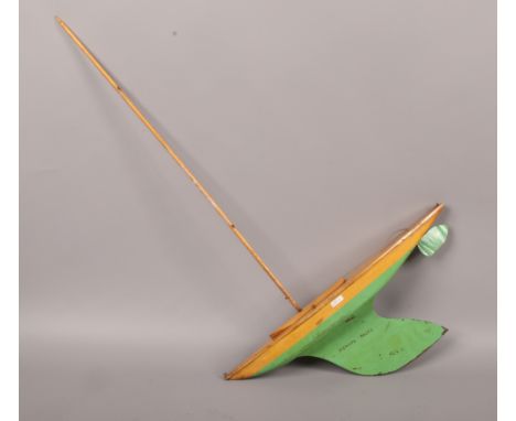 A vintage Bowman racing yacht made in England 54cm long 73cm mast No sail.