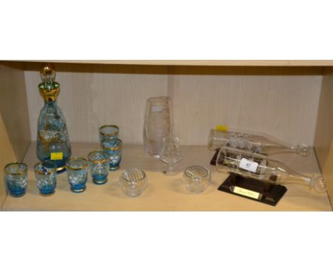 A Venetian decanter, six matching glasses, two spun glass ships and other items