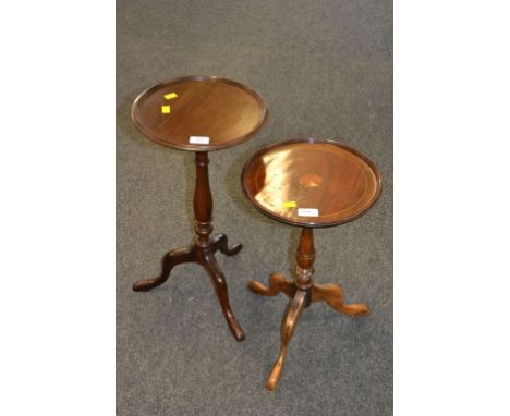 Two mahogany wine tables, one having boxwood fan inlaid top, each on tripod base