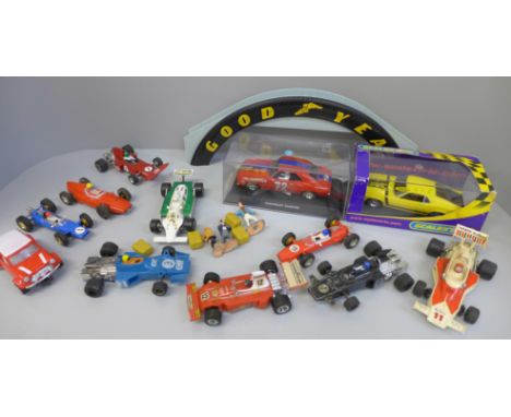 Scalextric slot racing cars including two boxed, and a Hornby Goodyear bridge 
