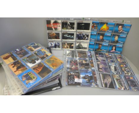 Eleven complete sets of science fiction trading card sets, including Star Trek and Enterprise sets: Andromeda, Battlestar Gal
