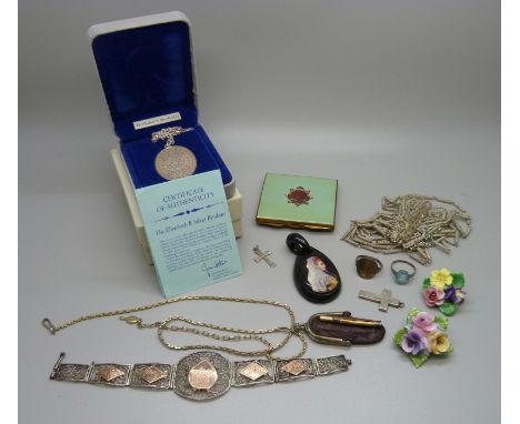 A collection of jewellery including a boxed silver pendant on chain, a compact, a filigree bracelet, a 9ct gold and silver ri