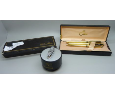 A set of Colibri pens and a Colibri advertising  lighter, set includes fountain pen, ballpoint and biro 